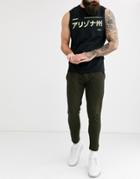 Asos Design Lightweight Skinny Sweatpants In Dark Olive Twisted Yarn Fabric-green