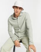 Asos Design Organic Long Sleeve Button Through Jersey Shirt In Washed Khaki-green
