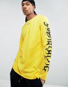 New Look Longline Top With Curved Hem And Sleeve Print - Yellow