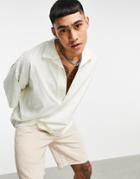 Asos Design Oversized Half Sleeve Polo With Deep V Polo In White-blues