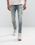 Asos Super Skinny Jeans In Vintage Mid Wash Blue With Abrasions - Blue
