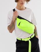 Asos Design Large Cross Body Fanny Pack In Neon Yellow With Slogan Strap - Yellow