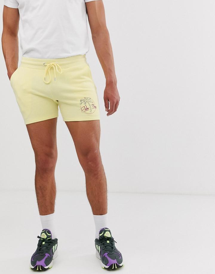 Asos Design Skinny Shorts In Shorter Length With Palm Print In Yellow