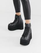 Demonia Kera Double Buckle Chunky Flatform Boots In Black