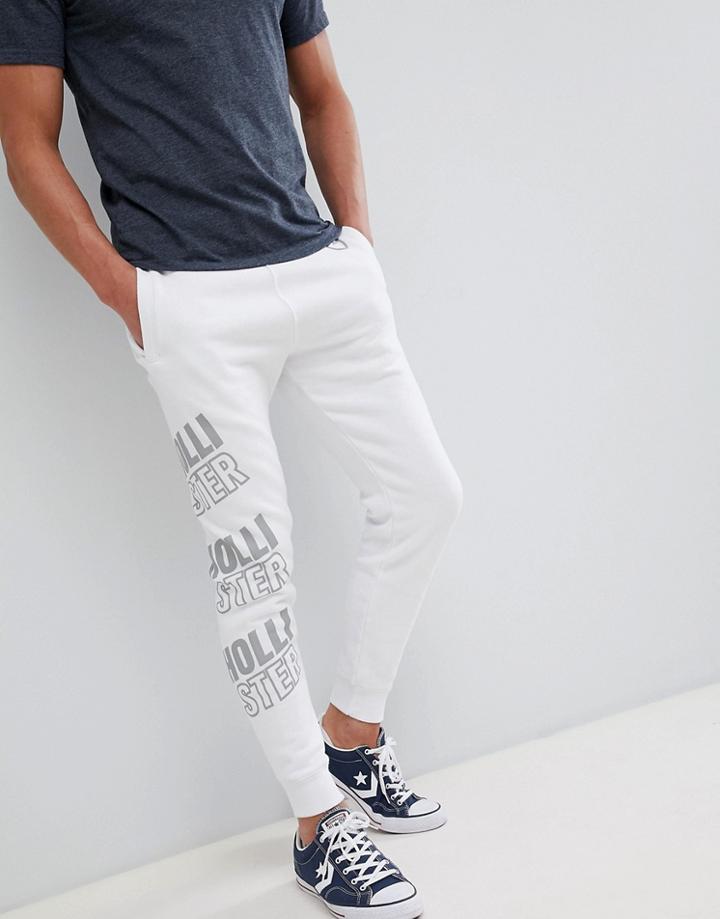 Hollister All Over Print Logo Super Skinny Joggers In White - White