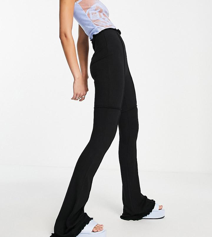 Topshop Tall Patchwork Seam Flared Pants With Ruffle Detail In Black