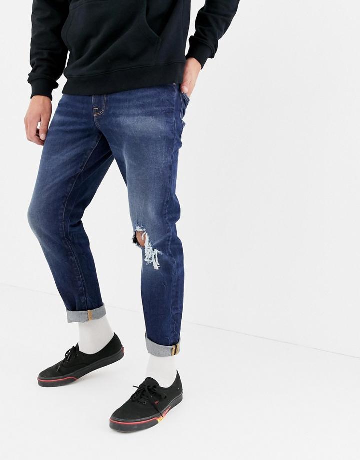 Asos Design 12.5oz Tapered Jeans In Dark Wash Blue With Rips