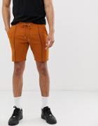 Asos Design Jersey Skinny Shorts With Piping In Rust-orange
