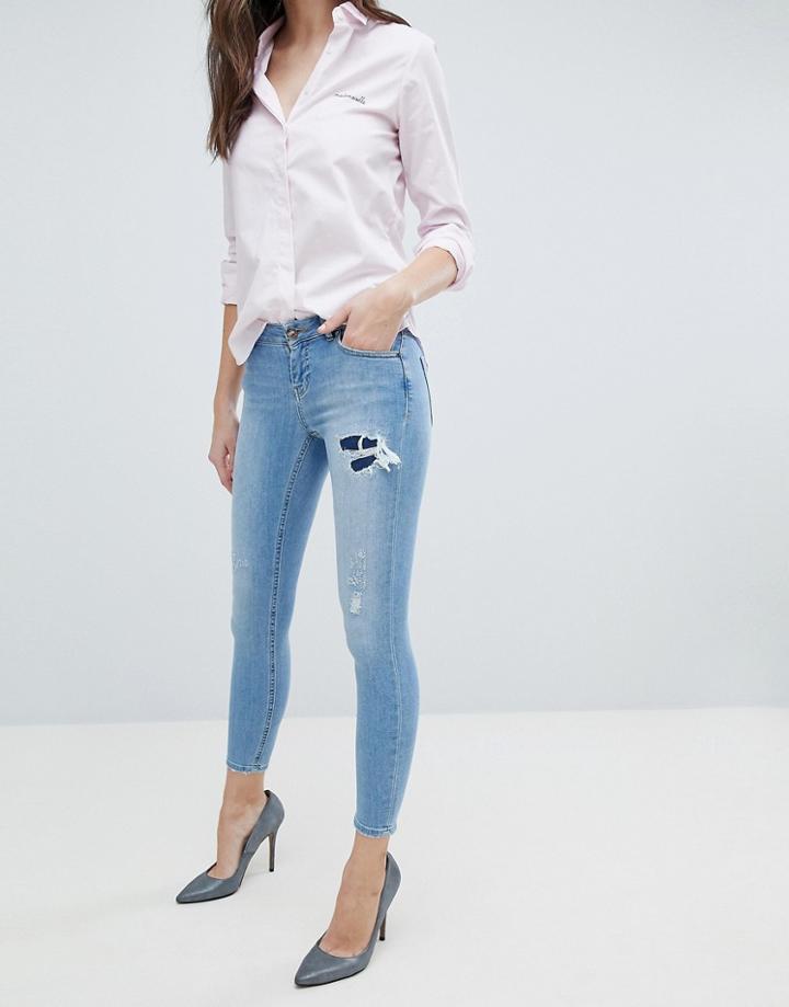 Asos Whitby Low Rise Skinny Jeans In Mid Wash Blue With Rip And Repair - Blue