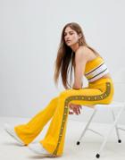 Ellesse Flared Joggers With Side Stripe Logo Taping Two-piece - Yellow