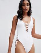 Asos Design Lace Up Front Crinkle Swimsuit In White - White