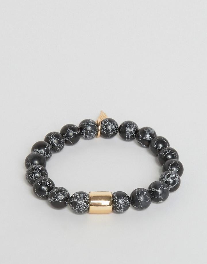Chained & Able Gold Hanging Wing Beaded Bracelet In Marble Effect - Black