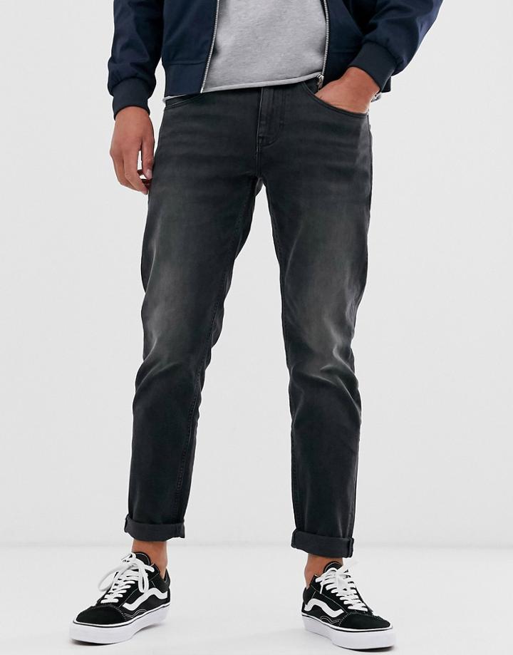 Asos Design Tapered Jeans In Washed Black In Recycled Cotton - Black