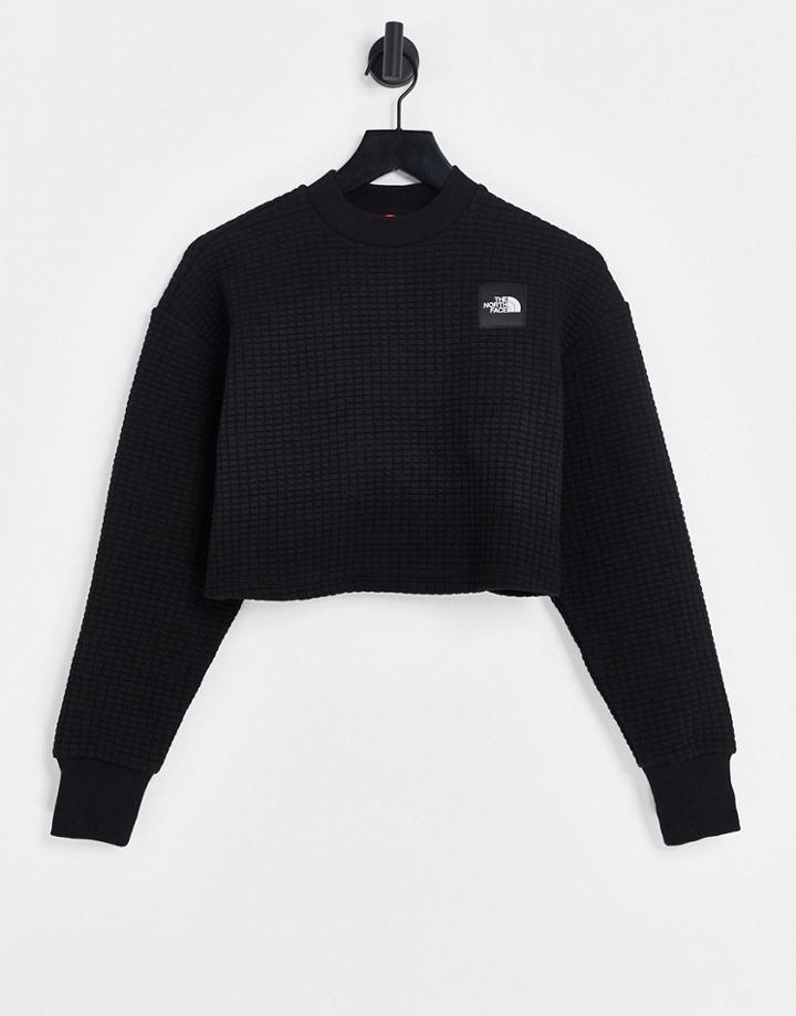 The North Face Mhysa Quilted Long Sleeve Crop Top In Black
