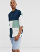 Asos Design Oversized Longline Polo Shirt With Half Sleeve And Patchwork Color Block In Navy
