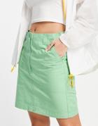 Lacoste Denim Mini Skirt In Light Green-gray