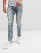 Asos Skinny Jeans In Mid Wash With Rip And Repair - Blue