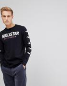 Hollister Sleeve Print Logo Long Sleeve Top In Black - Black