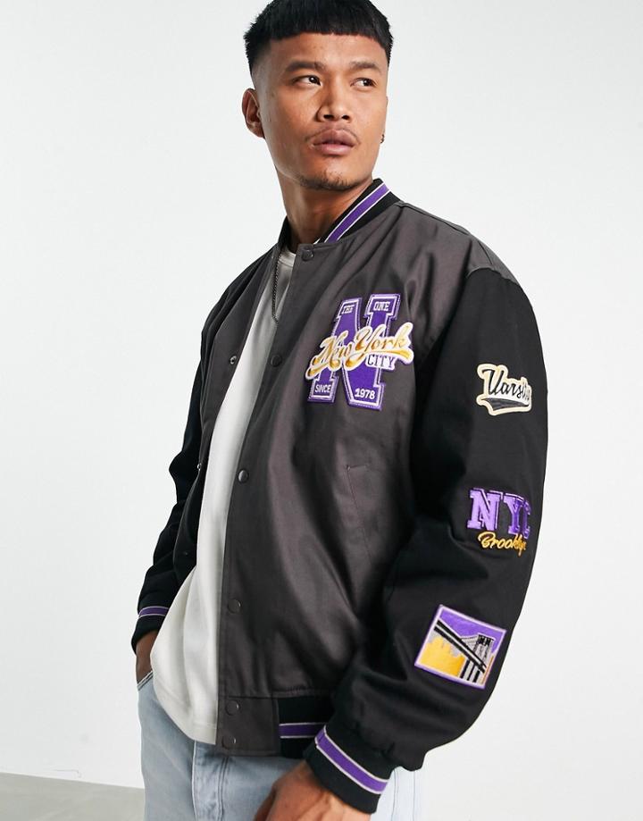 Asos Design Oversized Varsity Bomber Jacket In Black With Purple Badging