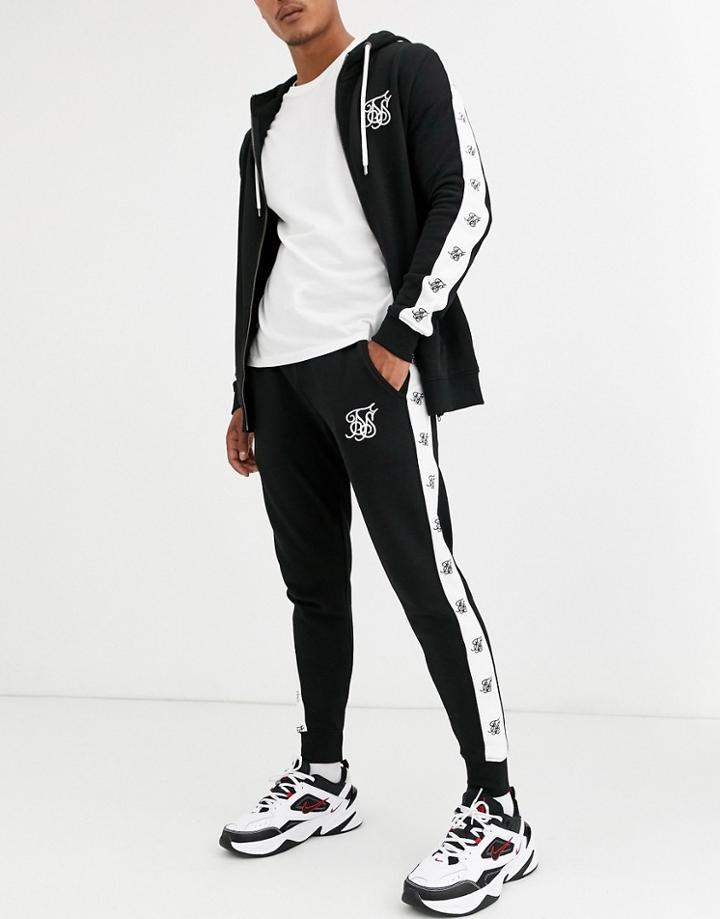 Siksilk Skinny Sweatpants With Side Logo In Black