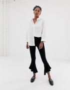Asos Design Ruffle Hem Legging With Metal Trim - Black