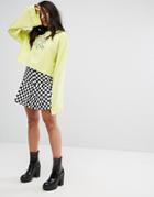 The Ragged Priest Pleated Skirt In Checkerboard - Black