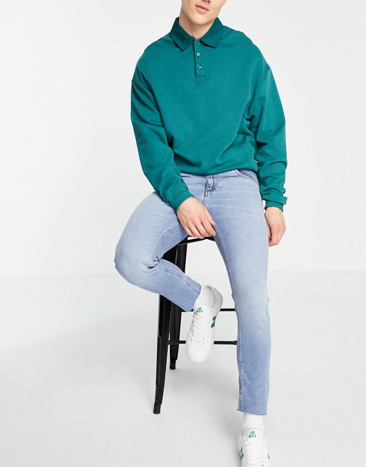 Asos Design Stretch Slim Jeans With 'less Thirsty' Wash In Light Blue With Raw Hem-blues