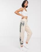 Asos Design Oversized Jogger With Placement Print - Beige