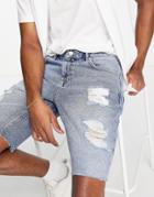 Asos Design Slim Denim Shorts In Mid Blue Wash With Heavy Rips