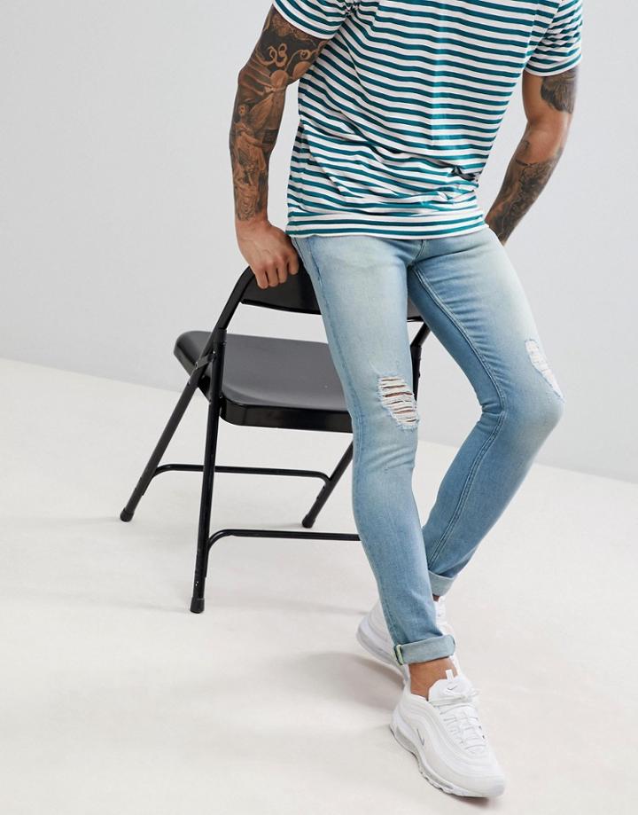 Asos Design Super Skinny Jeans In Mid Wash Blue With Rips - Blue