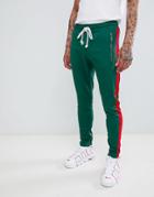 Criminal Damage Skinny Joggers In Green With Red Side Stripe - Green