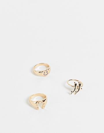 Asos Design Pack Of 3 Rings With Dolphin Horse Shoe And Happy Heart In Gold Tone
