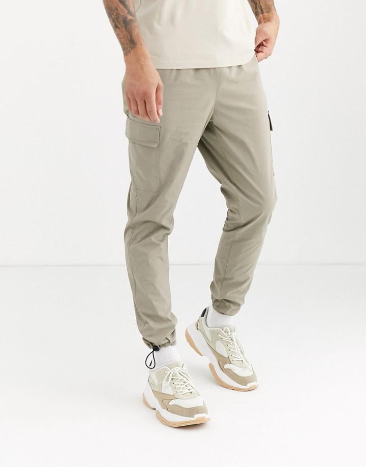 Asos Design Tapered Cargo Pants In Stone Nylon