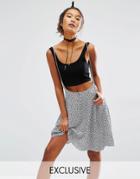 Reclaimed Vintage Low Strap Pinny Dress In Ditsy Floral Print - Black