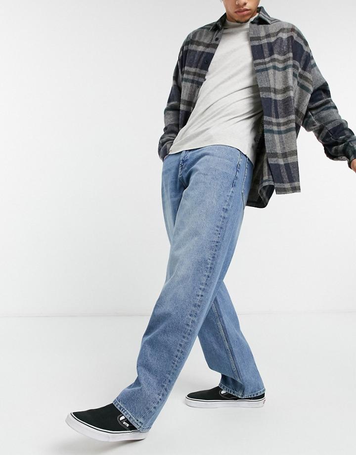 Asos Design Ultra Baggy Jeans In Vintage Mid Wash-blues