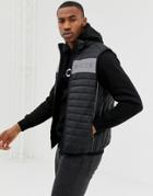Nicce Quilted Vest In Black With Reflective Panel