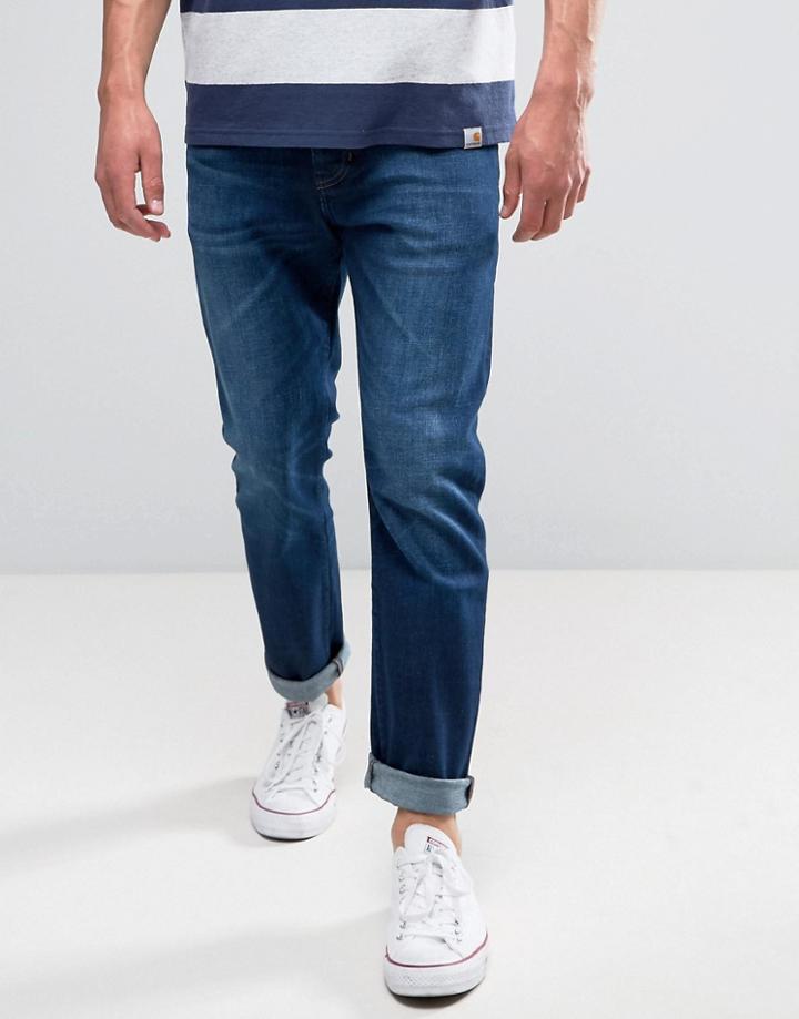 Wrangler Tapered Jeans In For Real Wash - Blue
