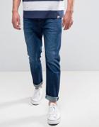 Wrangler Tapered Jeans In For Real Wash - Blue