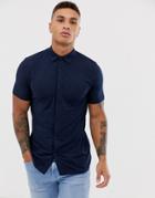 Asos Design Muscle Fit Button Through Jersey Polo In Navy