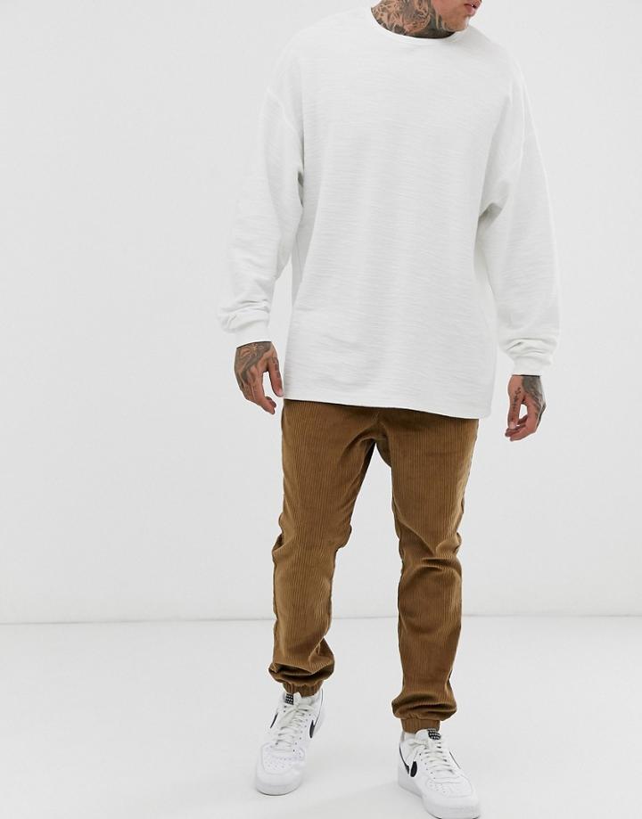 Asos Design Cord Tapered Sweatpants In Tan