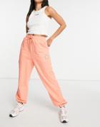 Asos Weekend Collective Oversized Sweatpants With Embroidered Logo In Coral-multi