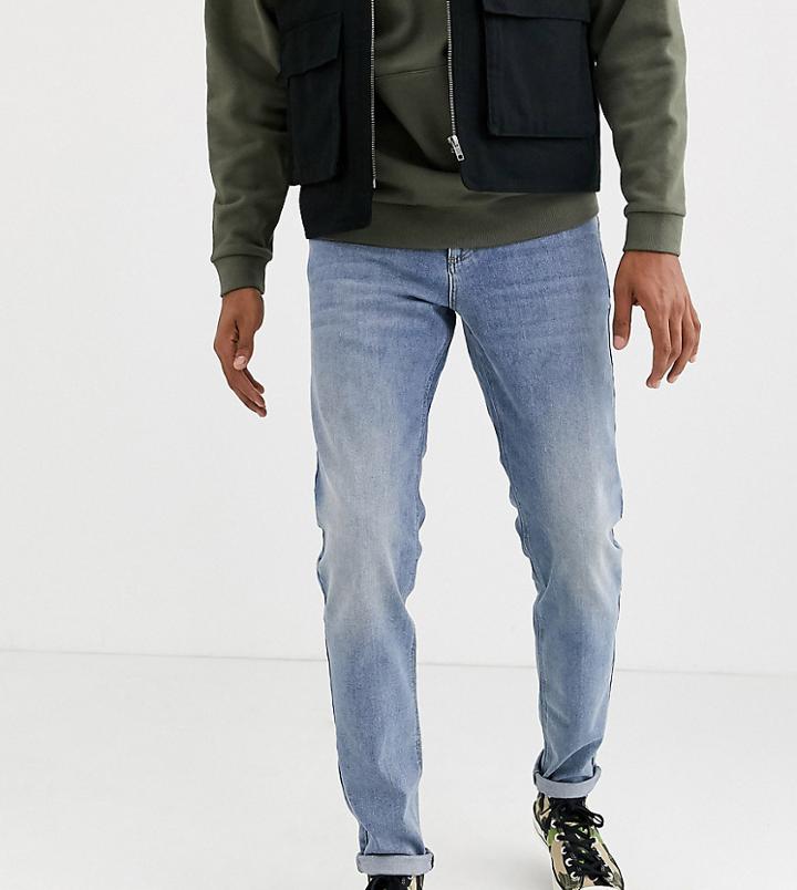 Asos Design Tall Tapered Jeans In Mid Wash Blue