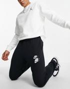 Nike World Tour Pack Graphic Cuffed Sweatpants In Black