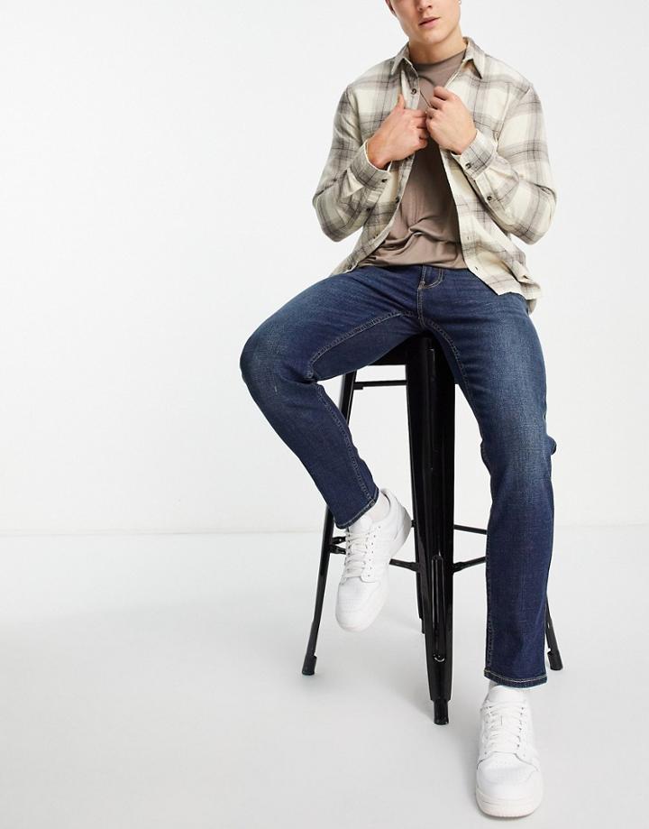 Hollister Slim Tapered Jeans In Mid Blue Wash