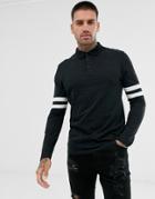 Asos Design Organic Long Sleeve Polo Shirt With Contrast Sleeve Stripe In Black - Black