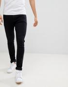 Asos Design Super Spray On Jeans In Black