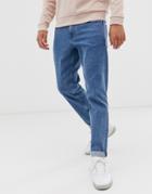 Asos Design Tapered Jeans In Retro Mid Wash Blue