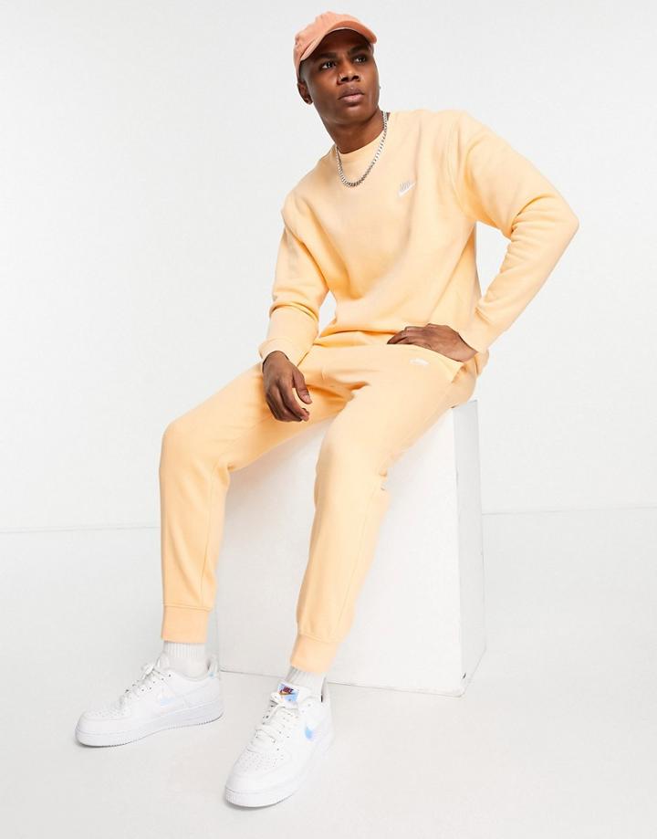 Nike Club Fleece Cuffed Sweatpants In Dusty Orange