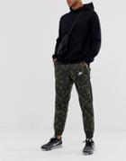 Nike Woven Sweatpants In Camo Print-green