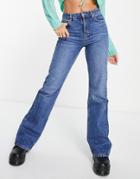 Topshop 90s Flare Recycled Cotton Blend Jean In Mid Blue-blues